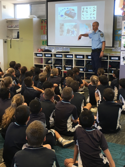 Students in Years 4-6 listening to our local police liaison office talk about Cyber Safety.