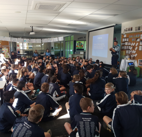 Snr Constable Bollard talking to Stage 3 about being safe when online.