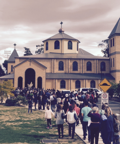 Procession returns to the church for Benediction