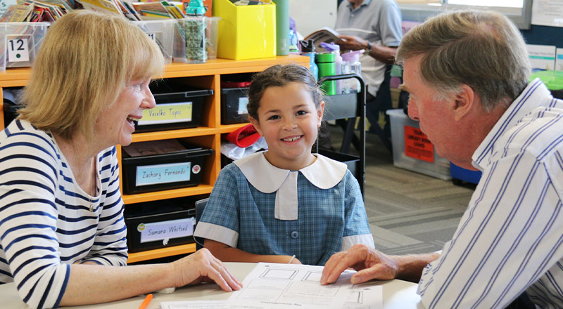 Student with her grandparents at Our Lady of the Angels Primary School Rouse Hill