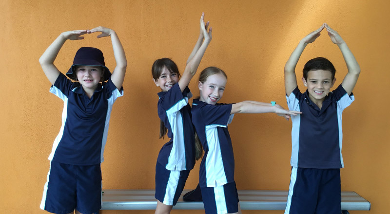 Students forming the letters 'OLA' at Our Lady of the Angels Primary School Rouse Hill
