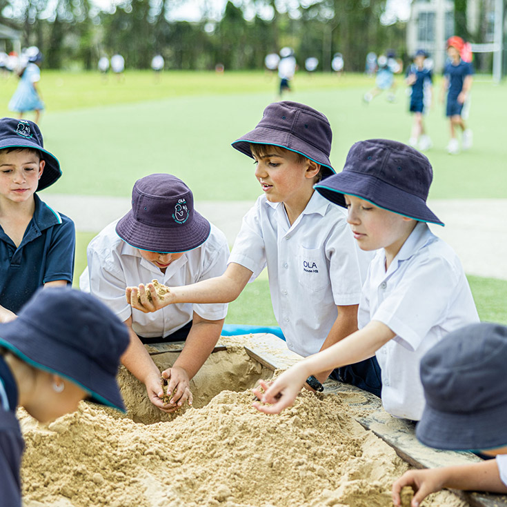 Students playing in the sand pit at Our Lady of the Angels Primary School Rouse Hill