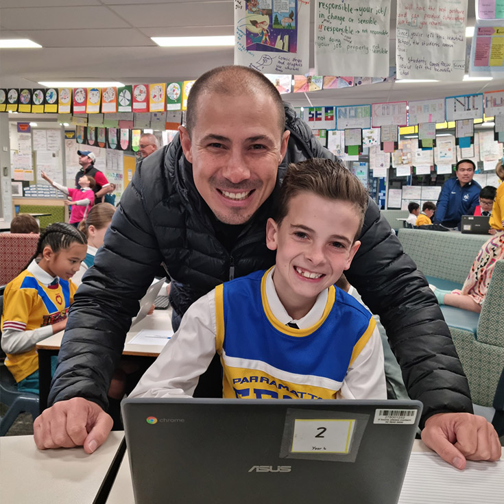 Student with his dad at Our Lady of the Angels Primary School Rouse Hill
